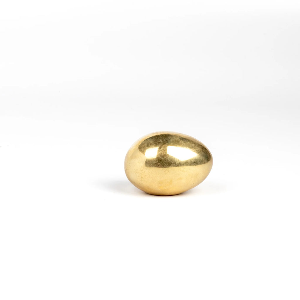 Carl Aubock Paperweight polished "Egg" 4867 on white background.