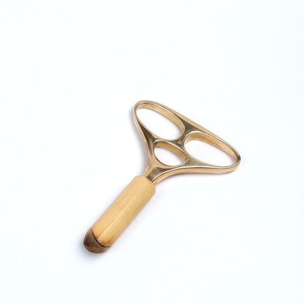 Carl Aubock Corkscrew 4230 Skull in polished brass with with wood holder. 