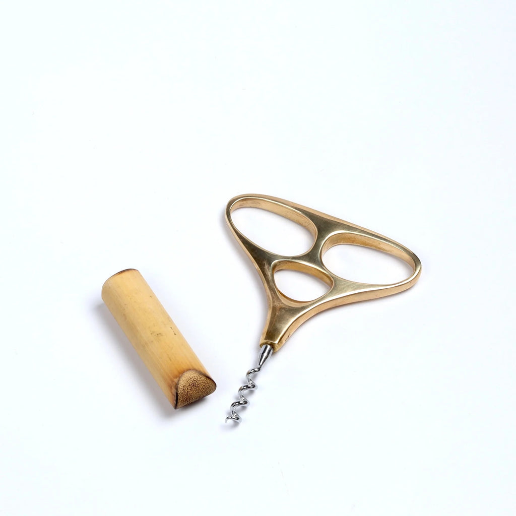 Carl Aubock Corkscrew 4230 Skull in polished brass with with wood holder. 