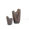 Aubock Vase 3794 in small and large are patina brass vases with two assymetrical openings that are polished on top.