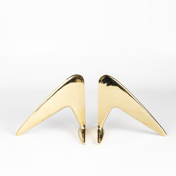 Aubock Bookends 4630 Hook are bookends in polished brass. Designed by Carl Auböck and handmade in Austria. Founded in 1906, the workshop is still owned and operated by the Auböck family (by Carl IV and V) from its original home, in a Vienna townhouse. OK has the largest selection of current Werkstätte Auböck production in the US and in stock, ready to ship.