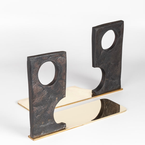 Aubock Bookends 3785 Urban Legend are sculptural bookends in patina with polished brass base. Designed by Carl Auböck and handmade in Austria. Founded in 1906, the workshop is still owned and operated by the Auböck family (by Carl IV and V) from its original home, in a Vienna townhouse. OK has the largest selection of current Werkstätte Auböck production in the US and in stock, ready to ship.