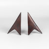 Aubock Bookends 3846 Rocket in Patina are scultural bookends in patinated brass.
Designed by Carl Auböck and handmade in Austria. Founded in 1906, the workshop is still owned and operated by the Auböck family (by Carl IV and V) from its original home, in a Vienna townhouse.
OK has the largest selection of current Werkstätte Auböck production in the US and in stock, ready to ship.