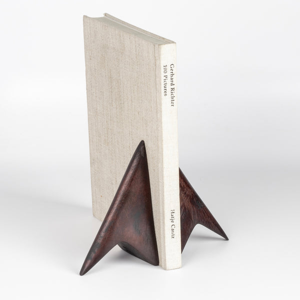 Side view of Aubock Bookends 3846 Rocket in Patina are scultural bookends in patinated brass.Designed by Carl Auböck. 