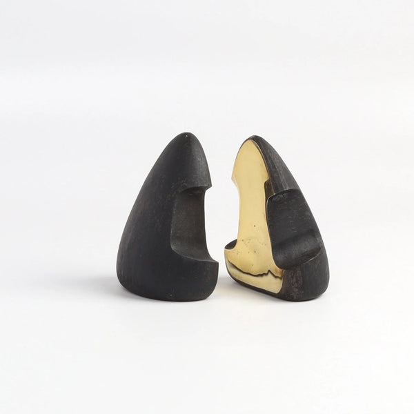 Carl Aubock Bookends 4637 in patina with polished ends on white background. 