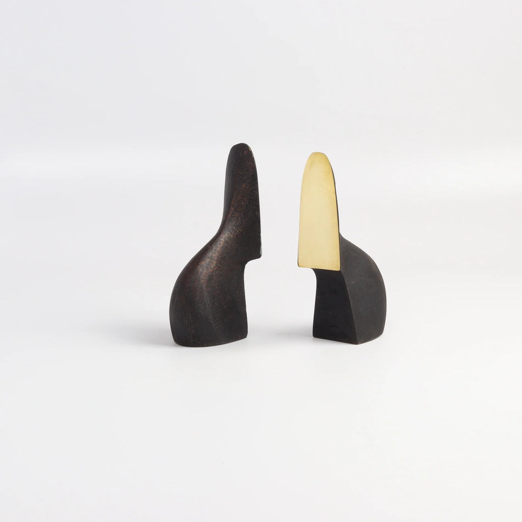 Carl Aubock Bookends 3652 turned on white.