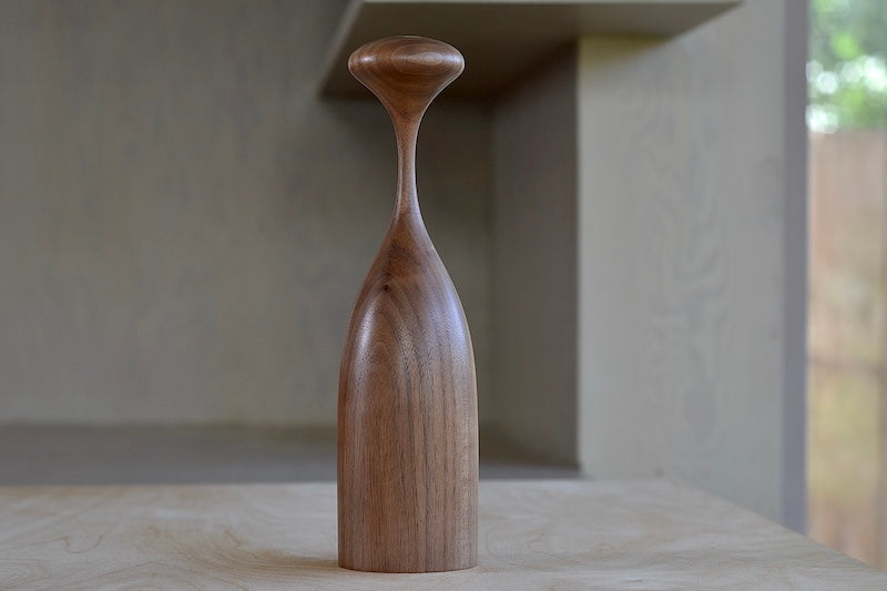 Serratus Pepper Mill Grinders that twist in Black Walnut. Made in solid ethically sourced wood in Canada.