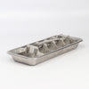 Classic  'Old School' stainless steel and pull up ice cube tray on white background 