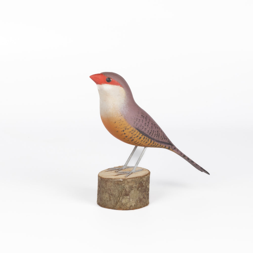 Bico de Lacre Bird from Brazil is a beautifully made fair trade wood bird modeled after birds from the region, this artisan makes them from reclaimed wood and supports his family by their production. 