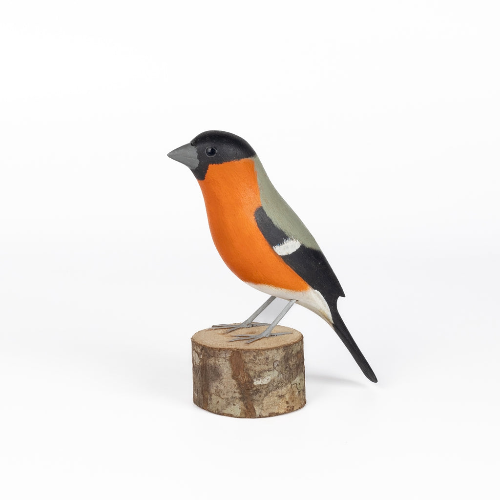 Peito Anaranjado Bird from Brazil is a beautifully made fair trade wood bird modeled after birds from the region, this artisan makes them from reclaimed wood and supports his family by their production. 