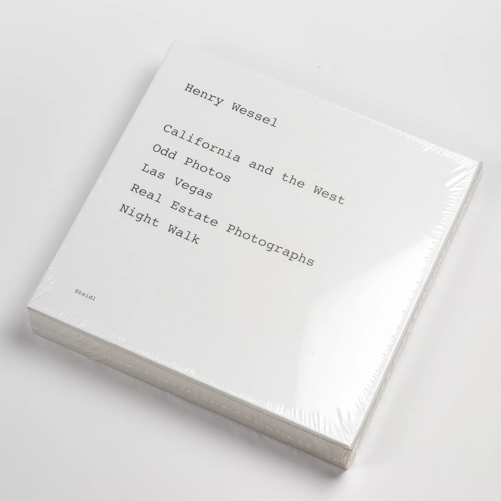 V Book Henry Wessel Steidl Five Books Slipcase From renowned photographer Henry Wessel come five photo stories on the landscape of Southern California and the American West taken between the 1970s and the early 2000s. California and the West, Odd Photos, Las Vegas, Real Estate Photographs and Night Walk are slipcased in this first collaboration with Steidl. A mint and out of print five book set in slipcase are available.