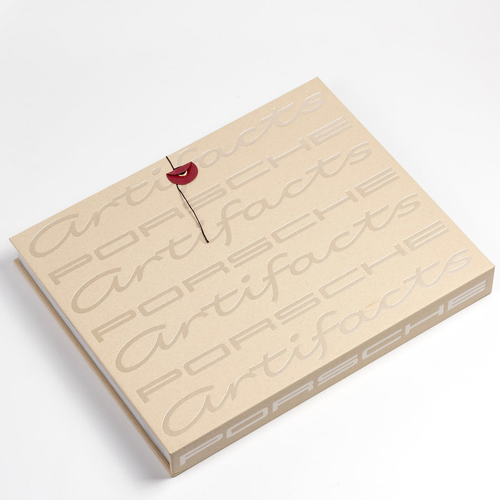 Artifacts Porsche Book published by ERG showing cream book.