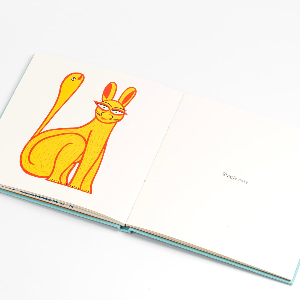 Another page from I Like Cats written by  Written by Anushka Ravishankar & various artists. 