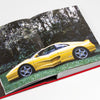 Page from Bart Kuykens Prancing Horses photo book dedicated to classic Ferraris and their drivers utilizing analog photography only.