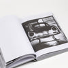 Page from Bart Kuykens 10th Anniversary photo book on orsche drivers and their cars.