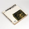 Vintage Book Isamu Noguchi A Sculptor's World is a rare and out of print first (1st) edition of Isamu Noguchi's autobiography in which he goes into detail about his philosophy and work, year by year. First Edition and first printing in very good vintage condition. Rare and out of print. Published by Thames and Hudson - Printed in Japan by Toppan Printing Co Limited Tokyo 1967.
