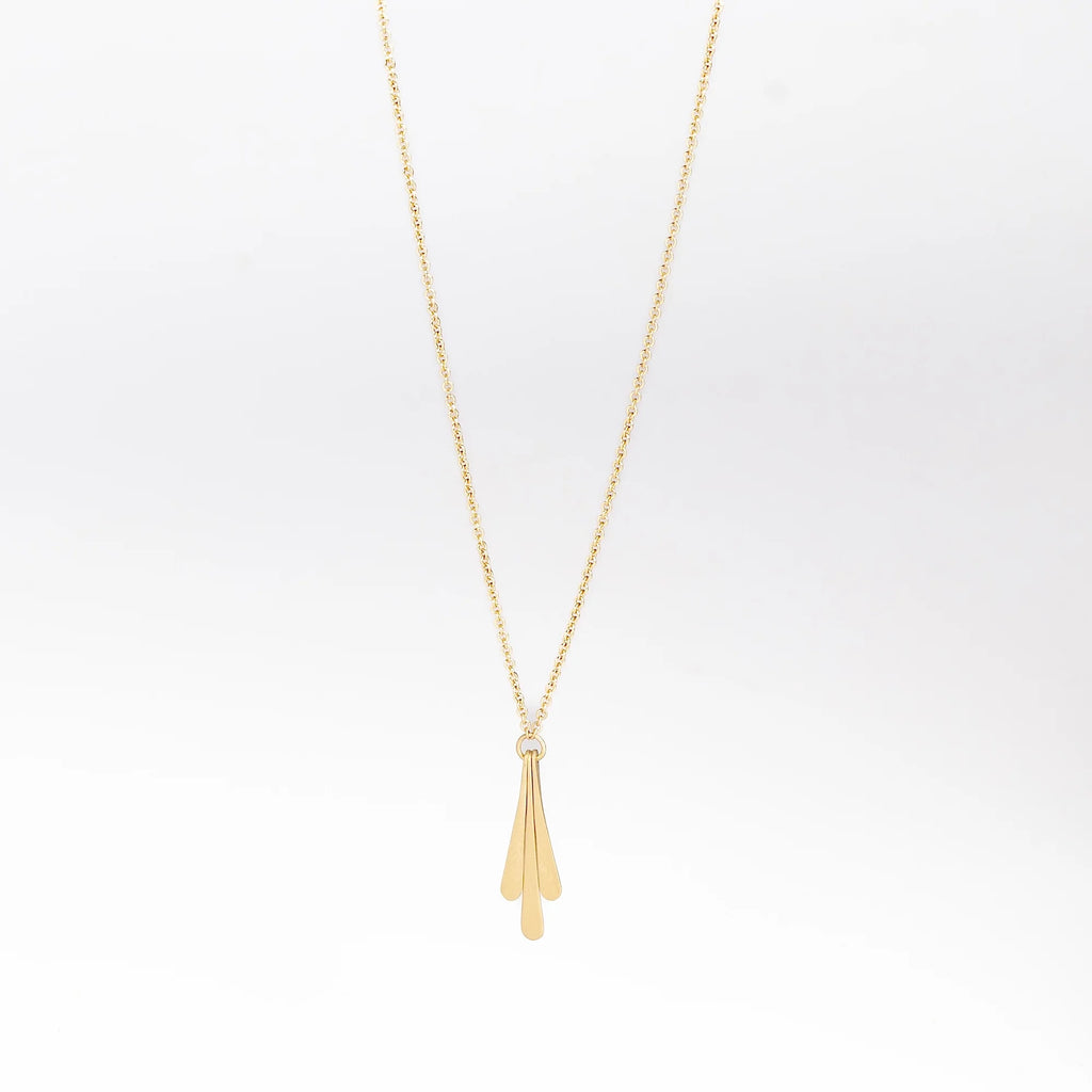 Triple Fringe Necklace on white background.