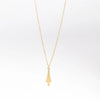 Triple Fringe Necklace on white background.