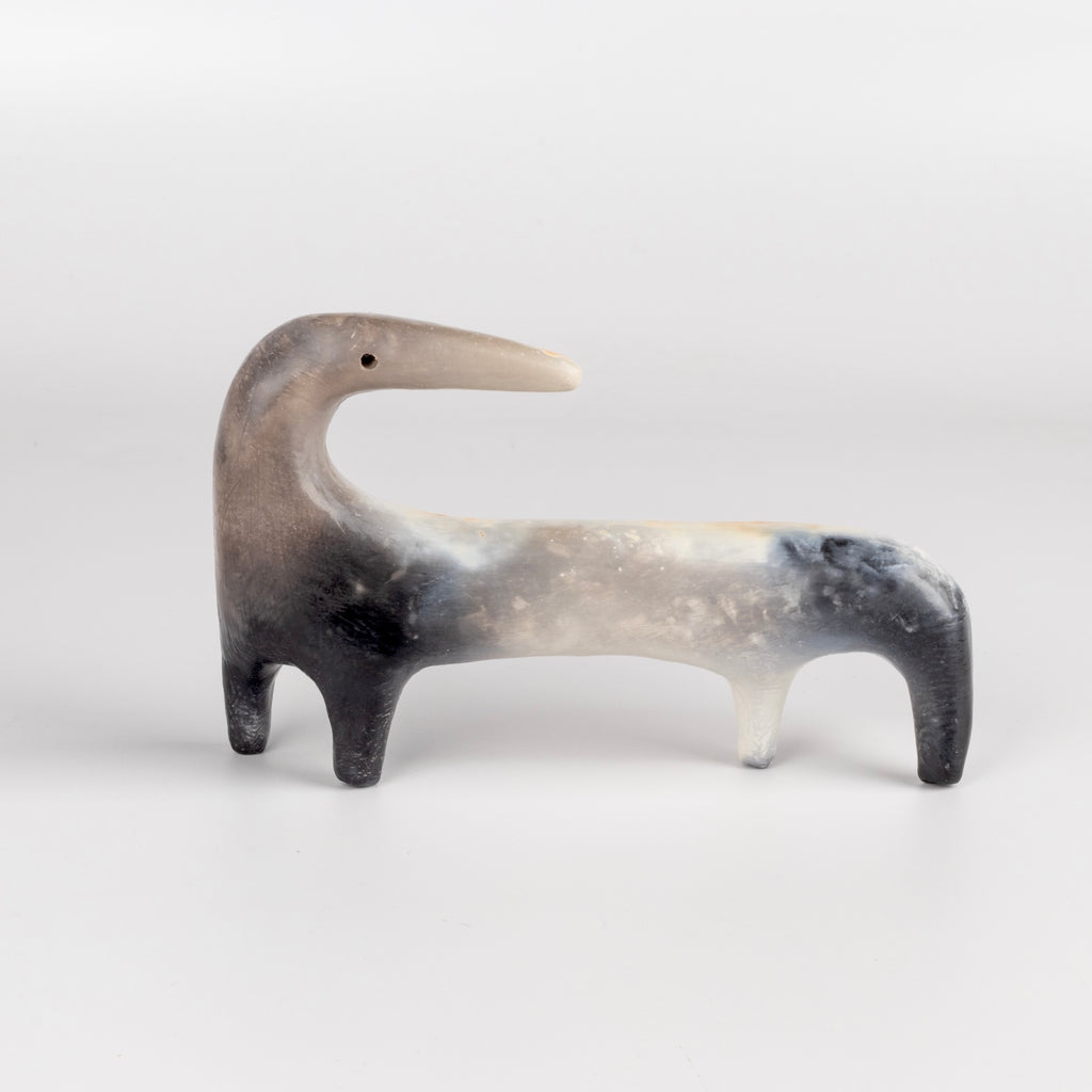 Other angle of Other side of The ceramic creature  figurine made by Carol Horst.