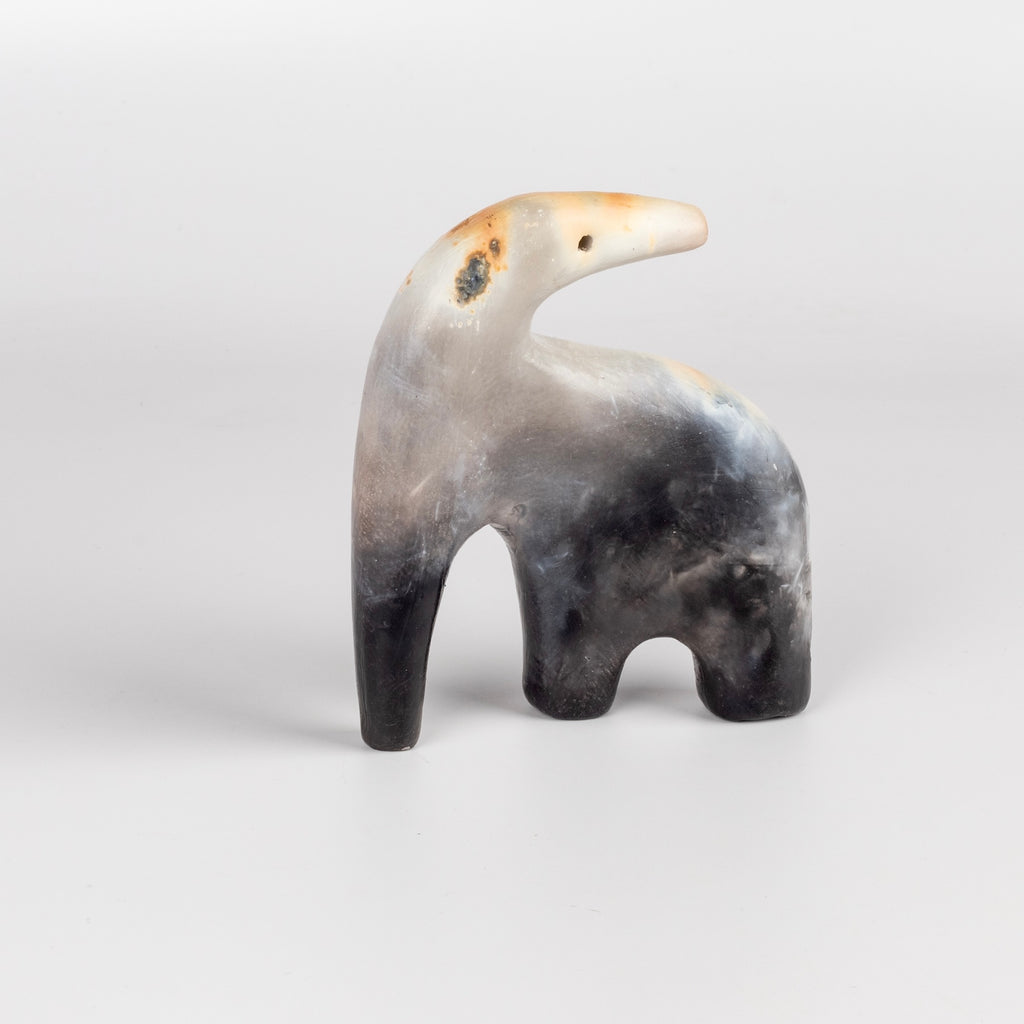 The ceramic creature is a one of a kind figurine made by Carol Horst in Los Angeles.