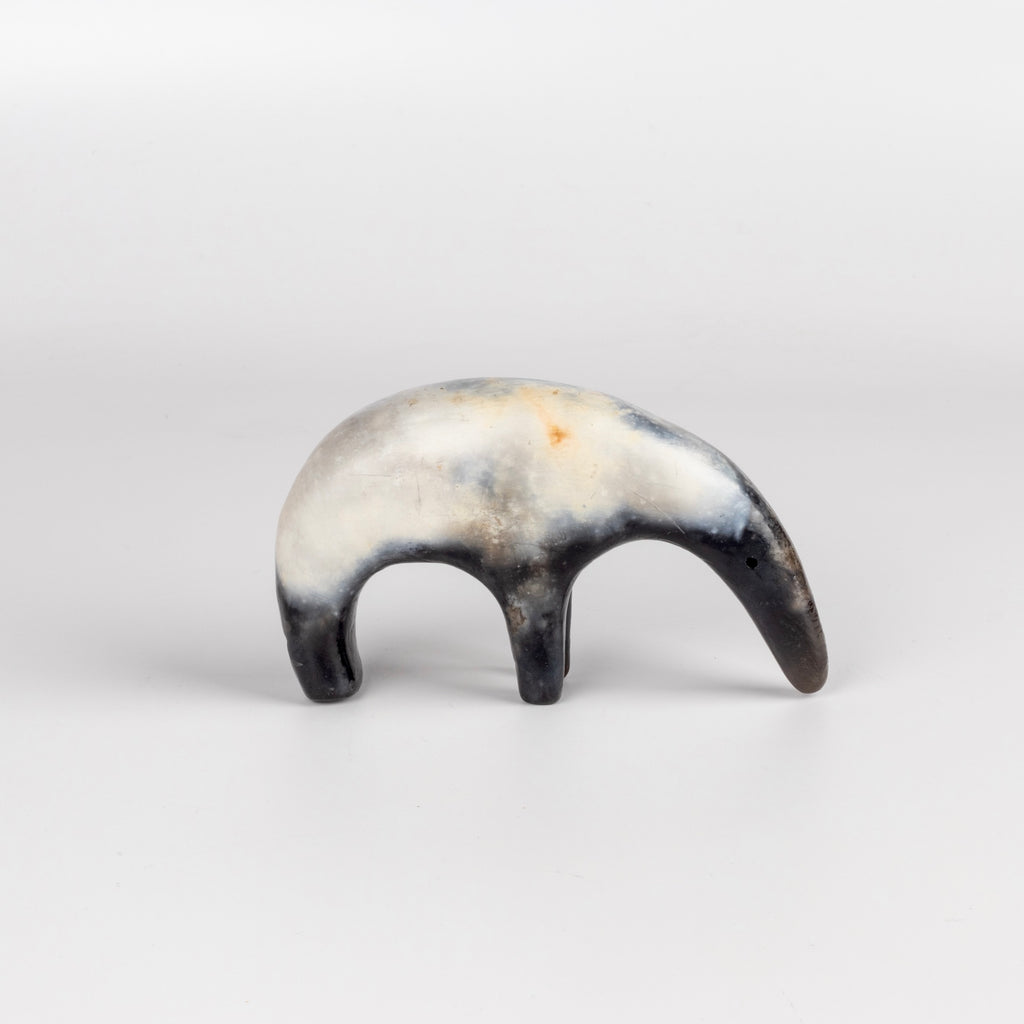 A one of a kind ceramic creature figurine made outof slab by hand and by Carol Horst in Los Angeles.