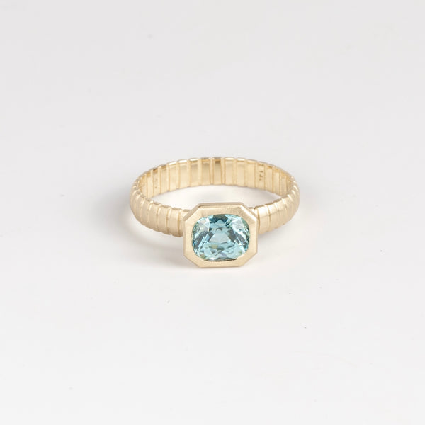 Blue Zircon Open Basket Signet on Ridged Band by Elizabeth Street Jewelry in size 6.5 is a one of a kind and oval cut blue zircon on a ridged band in 14k gold. Handmade in Los Angeles.