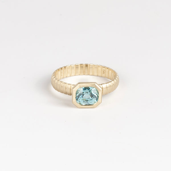 Blue Zircon Open Basket Signet on Ridged Band by Elizabeth Street Jewelry in size 6.5 is a one of a kind and oval cut blue zircon on a ridged band in 14k gold. Handmade in Los Angeles.