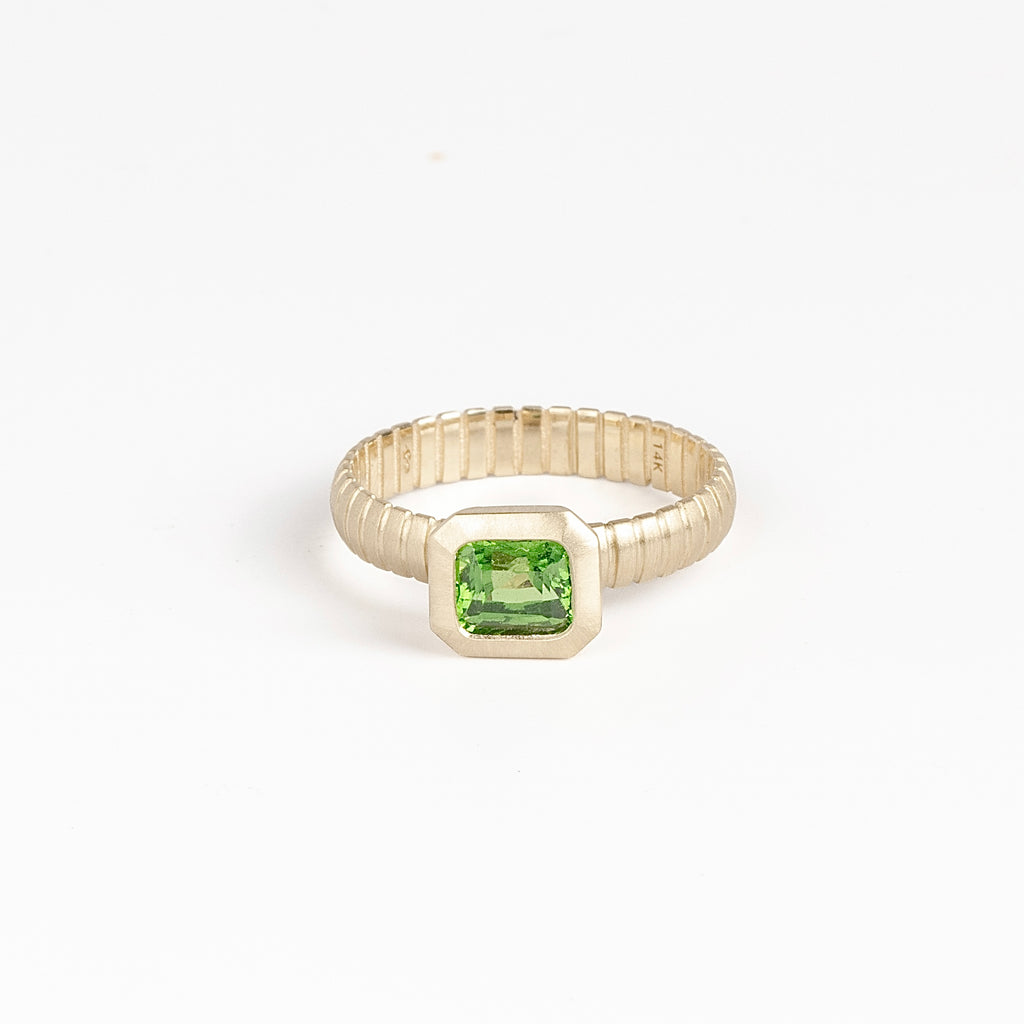 Tsavorite Open Basket Signet on Ridged Band by Elizabeth Street Jewelry in size 6.5 is a one of a kind and oval cut tsavorite on a ridged band in 14k gold. Handmade in Los Angeles.