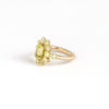 Side view of Peridot Chroma Flower ring by Elizabeth Street Jewelry.