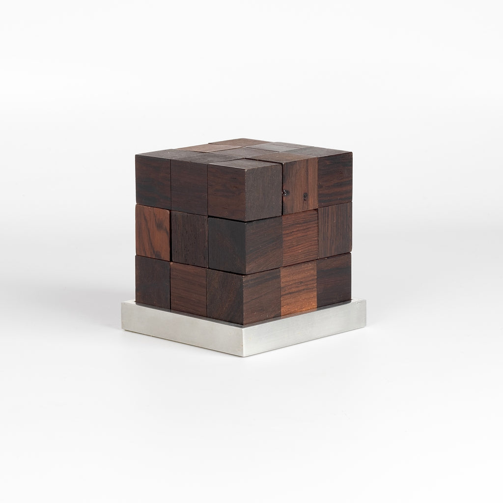 Vintage Danish Soma Cube ob white background by Piet Hein and produced by Parker Brothers.