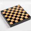 The New Berliner Chess Set box and board on white background.