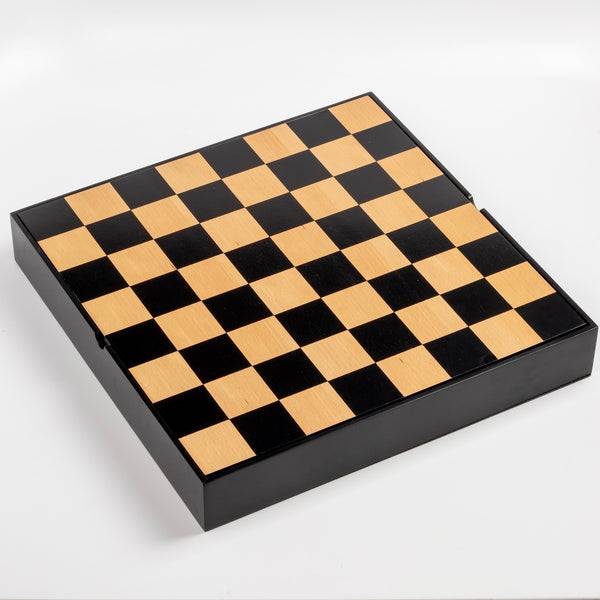 The New Berliner Chess Set box and board on white background.