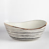 Circle Factory Painted Bowl 16x6 is a  turned wood bowl in Maple, painted black and white, with ridged grooves and stitch detailing by George Peterson. Made from salvaged wood in North Carolina and painted. Food safe, but finish can be affected if in contact with anything acidic.