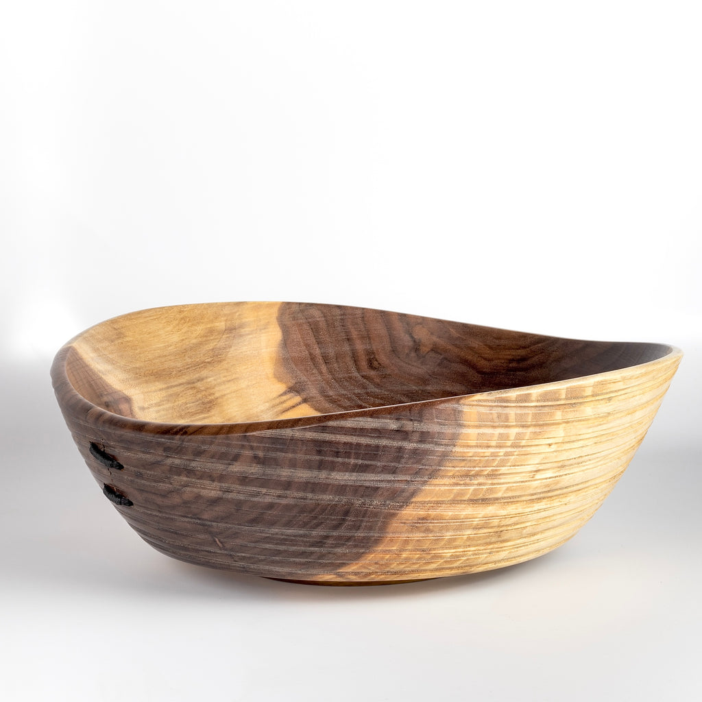 Circle Factory turned wood bowl in walnut with ridged grooves and stitch detailing by George Peterson. Made from salvaged wood in North Carolina and painted. Food safe, but finish can be affected if in contact with anything acidic.