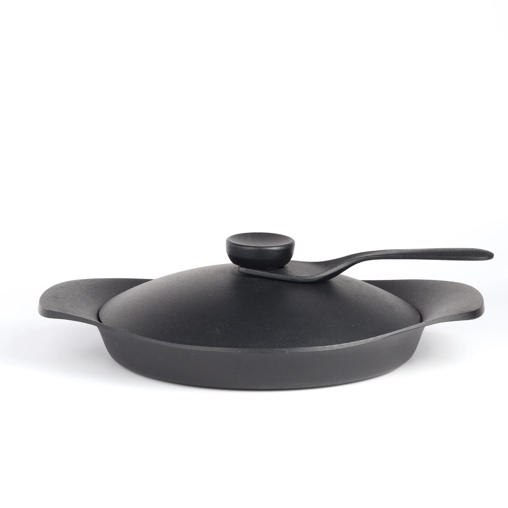 Sori Yanagi designed stove top grill pan on white background.