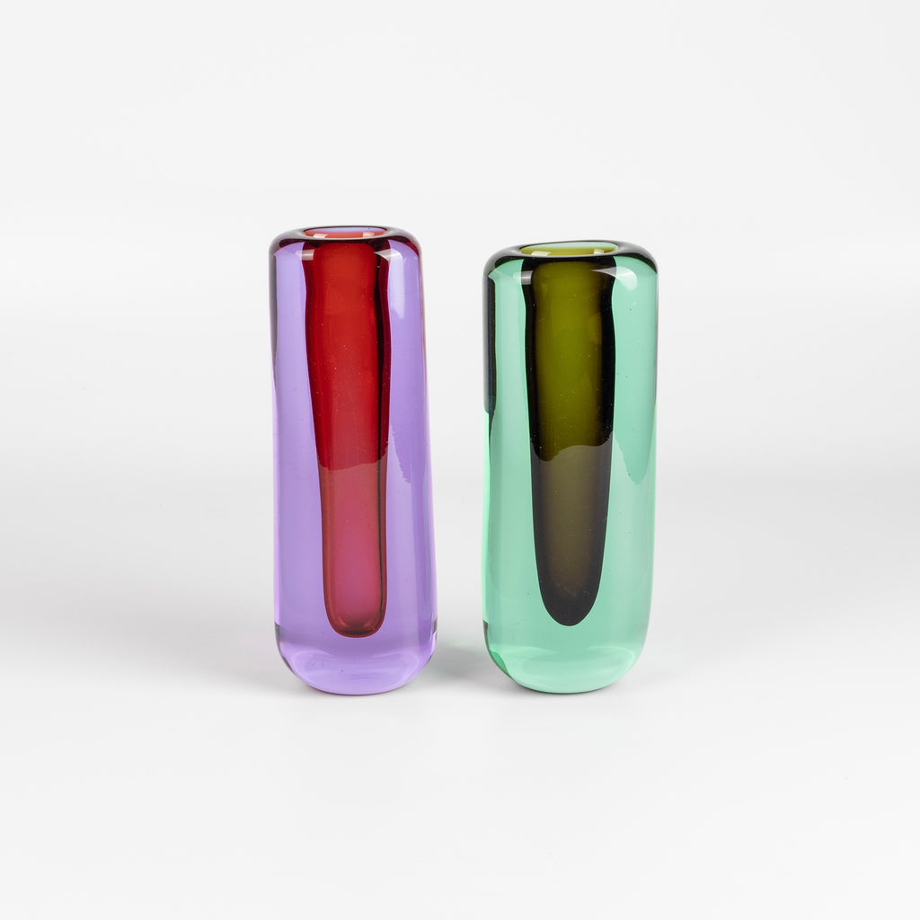 The Sommerso vase by Lynn Read is free blown cylinder vase utilizing a classic Italian technique where one color is submerged in another. Made in Portland, Oregon.