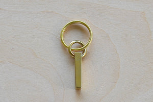 'I' Letter keyring, key chain, key ring in brass made by Carl Aubock. 