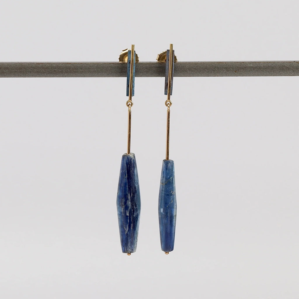 Lapis and Kyanite on Stick and Strand Earrings by Kathleen Whitaker are One of a kind kyanite stones with natural inclusions that are drilled and prism shaped and attached to Kathleen Whitaker's signature stick and strand with post closure. Stone collection.