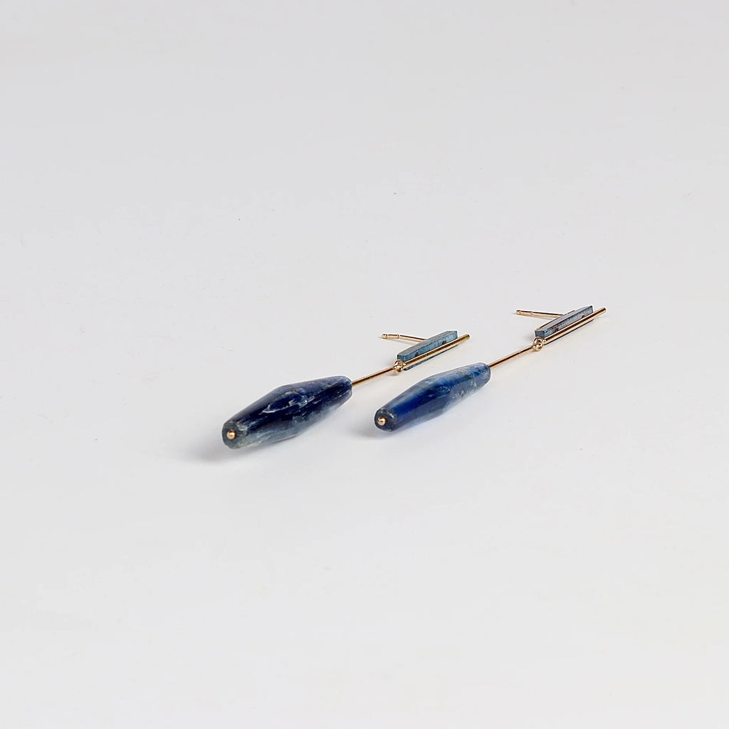Lapis and Kyanite on Stick and Strand Earrings by Kathleen Whitaker are One of a kind kyanite stones with natural inclusions that are drilled and prism shaped and attached to Kathleen Whitaker's signature stick and strand with post closure. Stone collection.