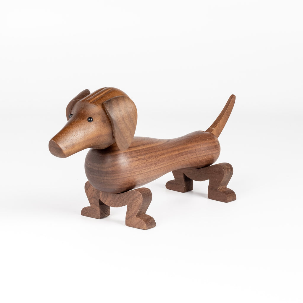 Danish wood dog figurine or sculpture designed by Kay Bojesen in 1934 and made in oiled walnut.