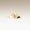 Large Kaylin Hertel Origami stud Studs Earrings in 14k yellow gold on white background.