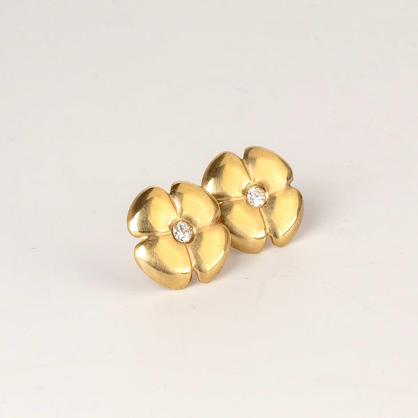 Large flower stud by Kaylin Hertel in white diamond on white background.