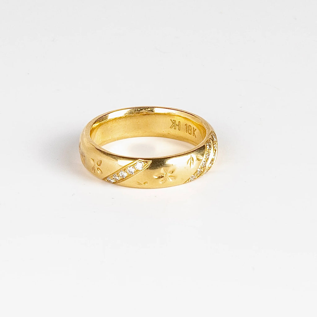 Striped Petal Print Band in 18k yellow gold with Canadian diamonds by Kaylin Hertel on white background.