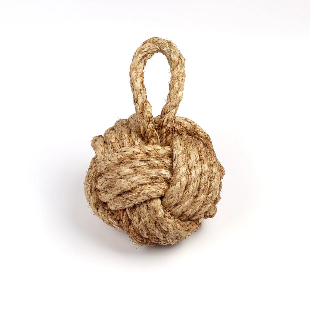 Knot door stop in rope.