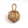 Knot door stop in rope.