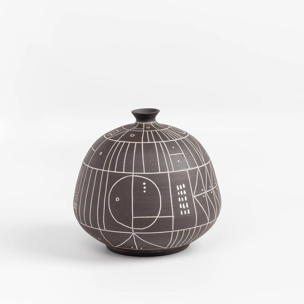 The HR 400 'Scribe" vase is a ceramic  hand thrown stoneware vase with sgraffito patterns by Heather Rosenman. 