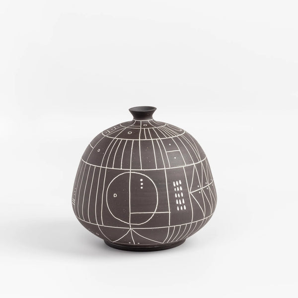 The HR 400 'Scribe" vase is a ceramic  hand thrown stoneware vase with sgraffito patterns by Heather Rosenman. 