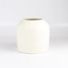 Lilith Rockett Urn Vase is wheel thrown porcelain with gloss glaze on the interior and an unglazed exterior.