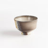 Other side of Kazegama Wood Fired Footed Tea Bowl by Lilith Rockett.
