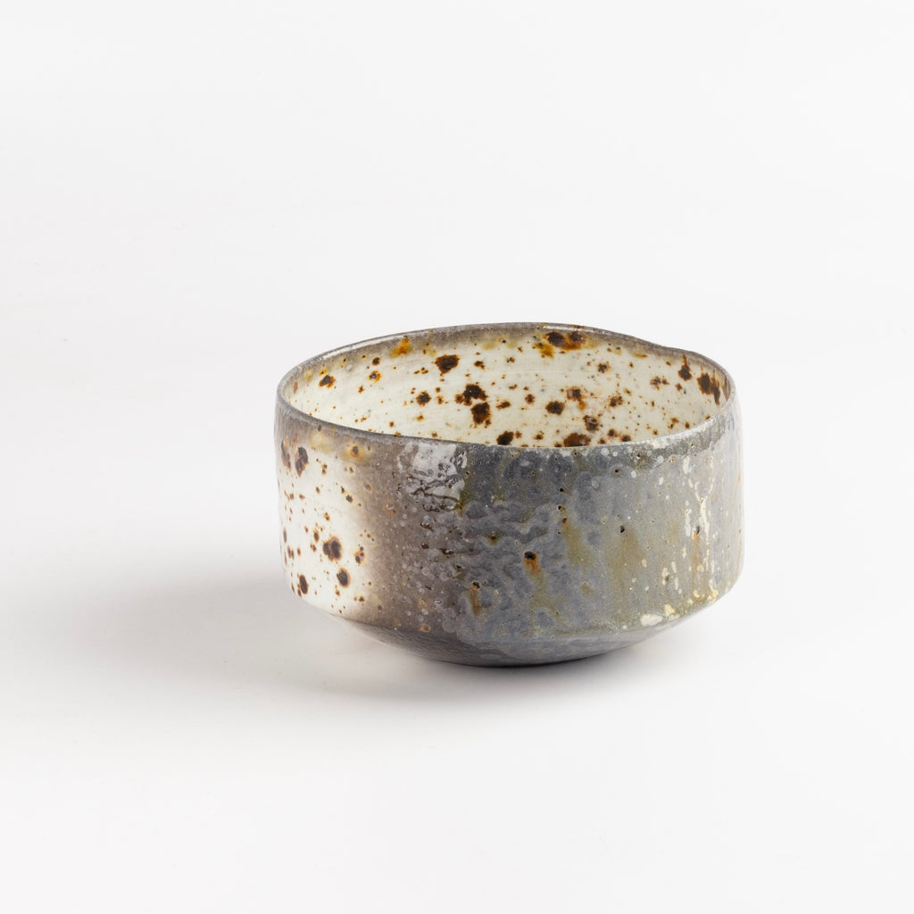 Other side of Wood Fired Tea Bowl With Spots on White by Lilith Rockett, a one of a kind wood fired tea bow.